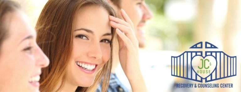build-confidence-woman-with-white-smile-between-friends-on-street-jcblog2