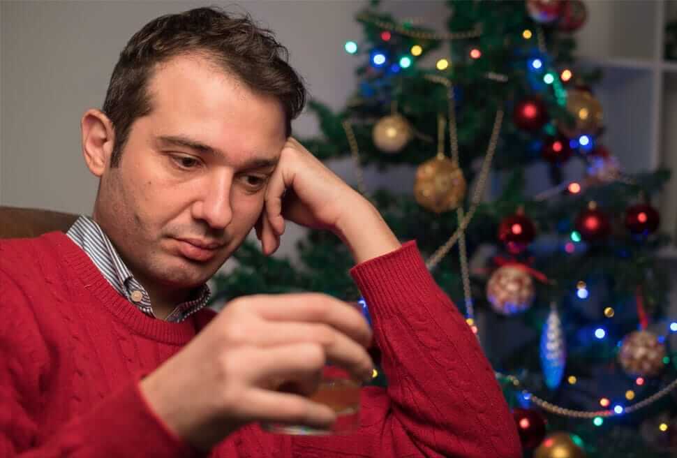 man looking depressed during the holidays
